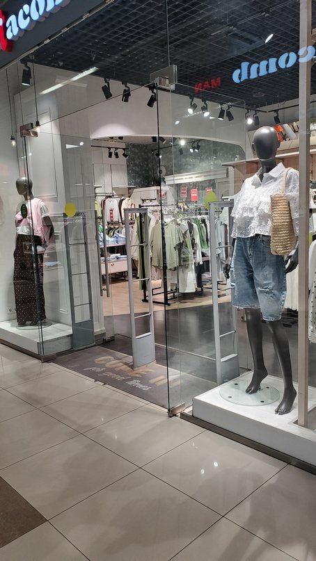 Gates next to mannequins in entrance zone